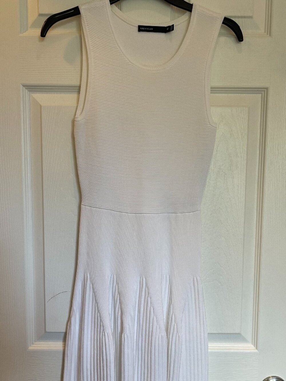 Karen Millen: no sleeves midi dress form fitting